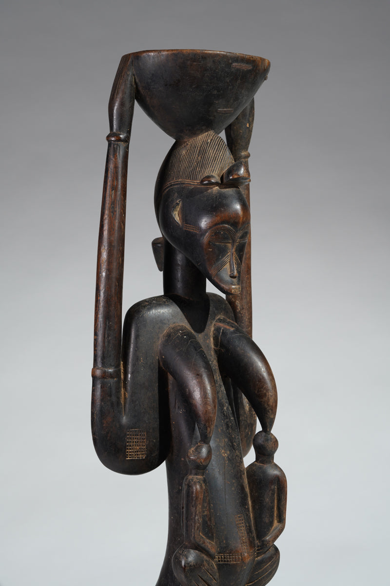 A Senufo maternity sculpture