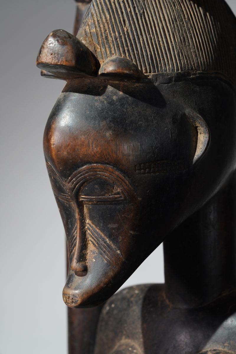 A Senufo maternity sculpture