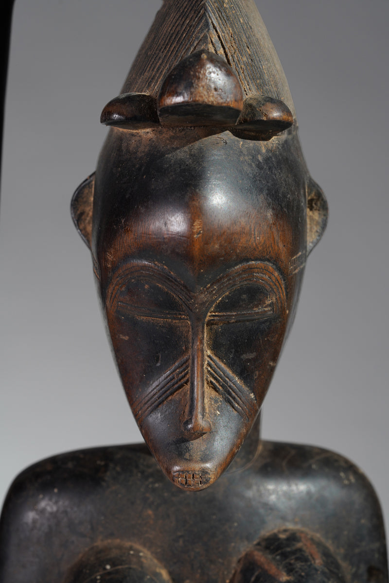 A Senufo maternity sculpture