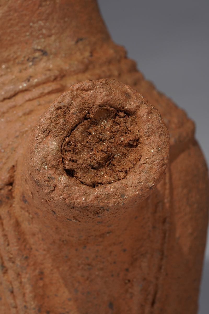 A fragmentary terracotta sculpture