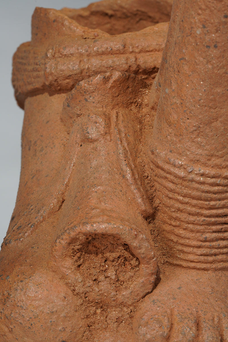 A fragmentary terracotta sculpture