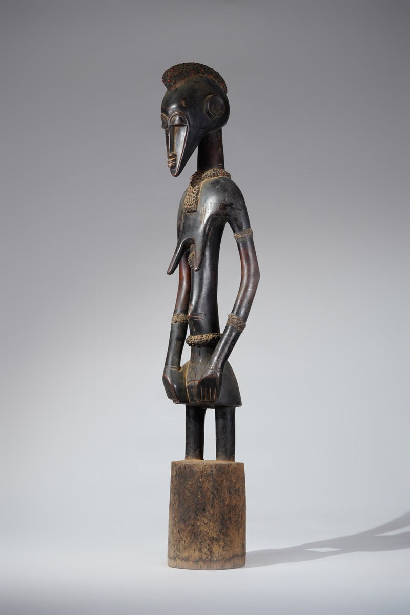 A female Senufo Rhythm pounder