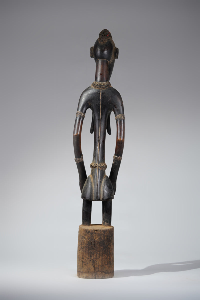 A female Senufo Rhythm pounder