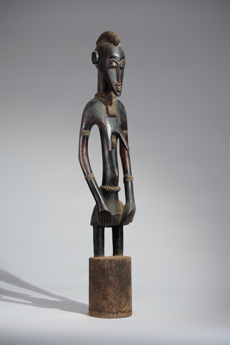 A female Senufo Rhythm pounder