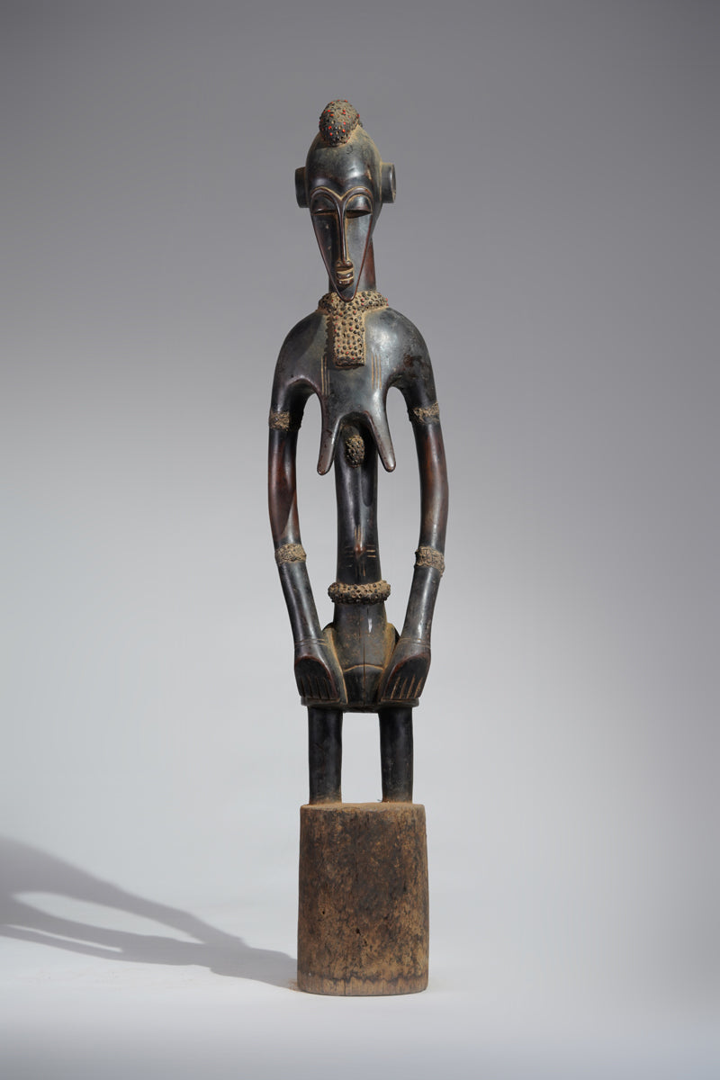 A female Senufo Rhythm pounder