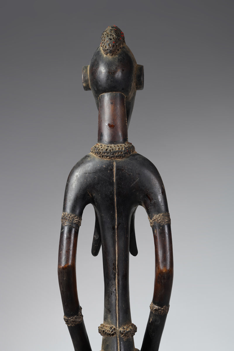 A female Senufo Rhythm pounder