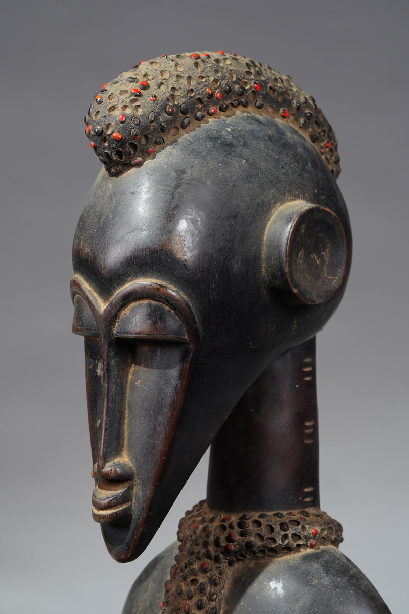 A female Senufo Rhythm pounder