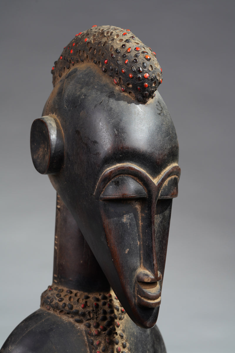 A female Senufo Rhythm pounder