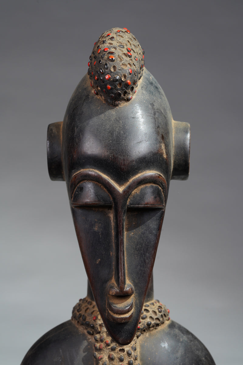 A female Senufo Rhythm pounder