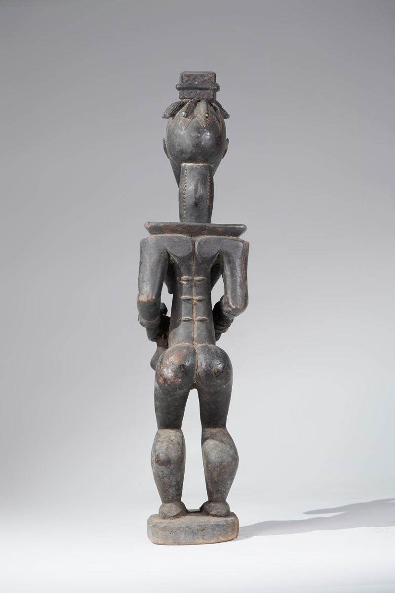 A female Guro sculpture