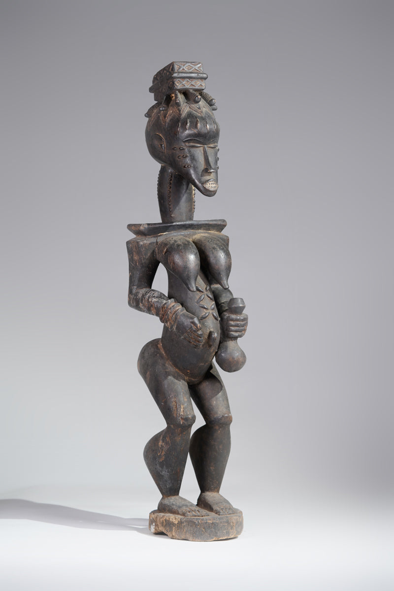A female Guro sculpture