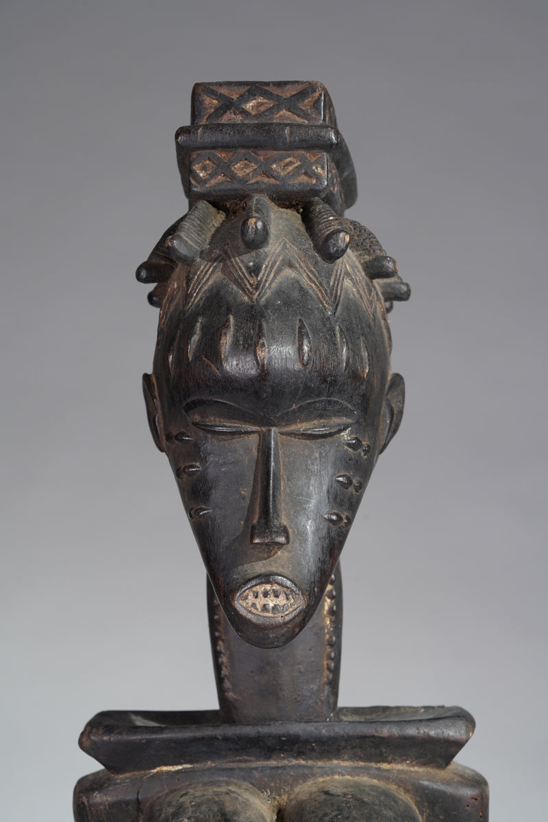 A female Guro sculpture