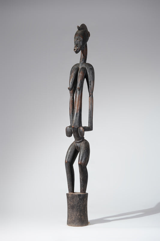 A female Senufo Rhythm pounder - called Débéle