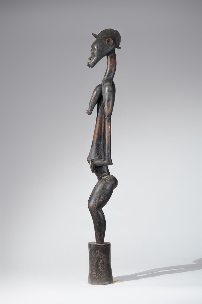 A female Senufo Rhythm pounder - called Débéle