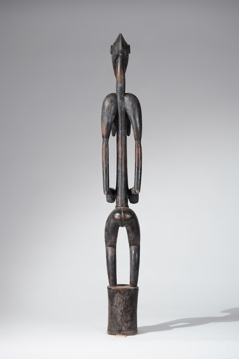 A female Senufo Rhythm pounder - called Débéle