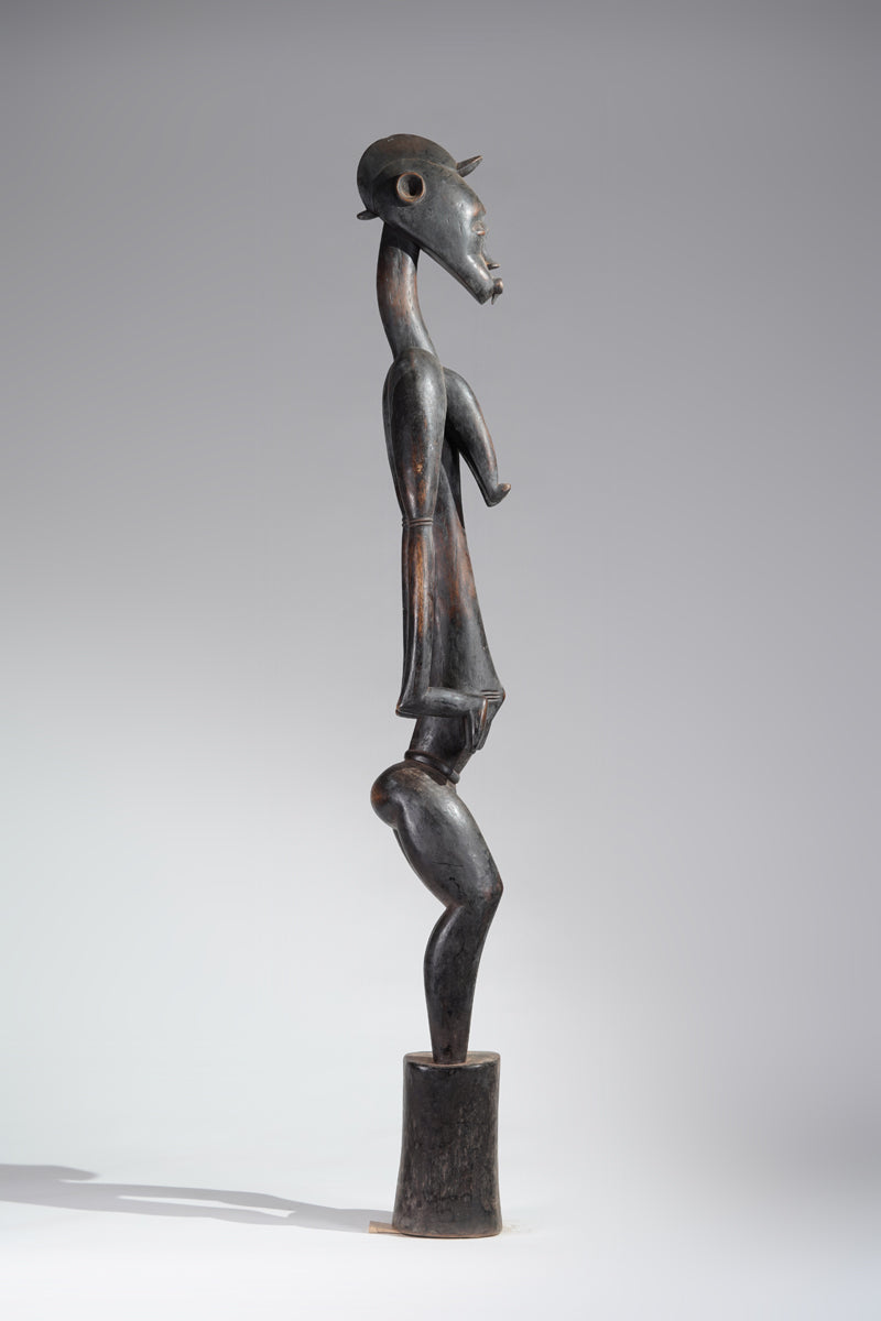 A female Senufo Rhythm pounder - called Débéle