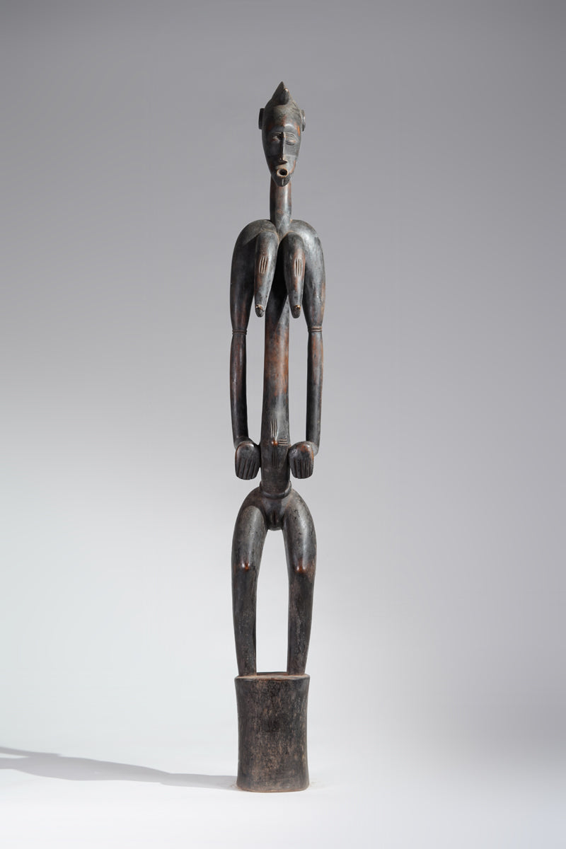 A female Senufo Rhythm pounder - called Débéle