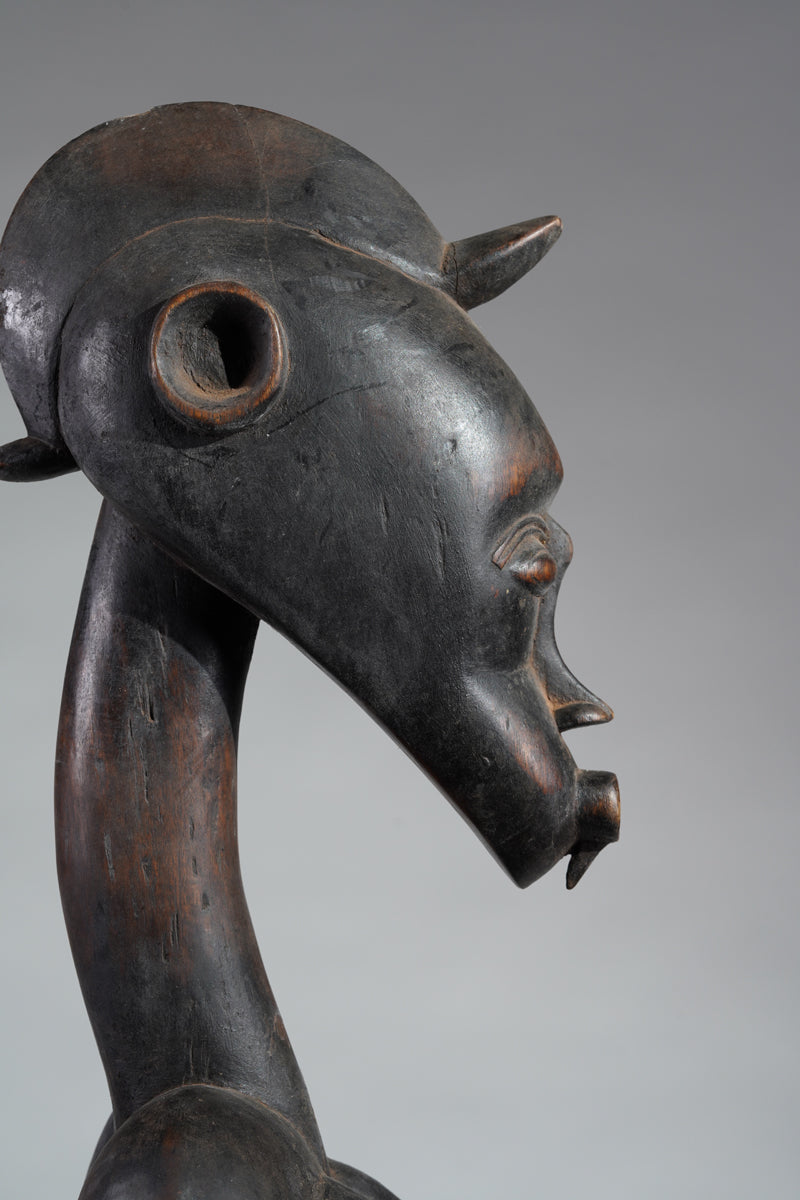 A female Senufo Rhythm pounder - called Débéle