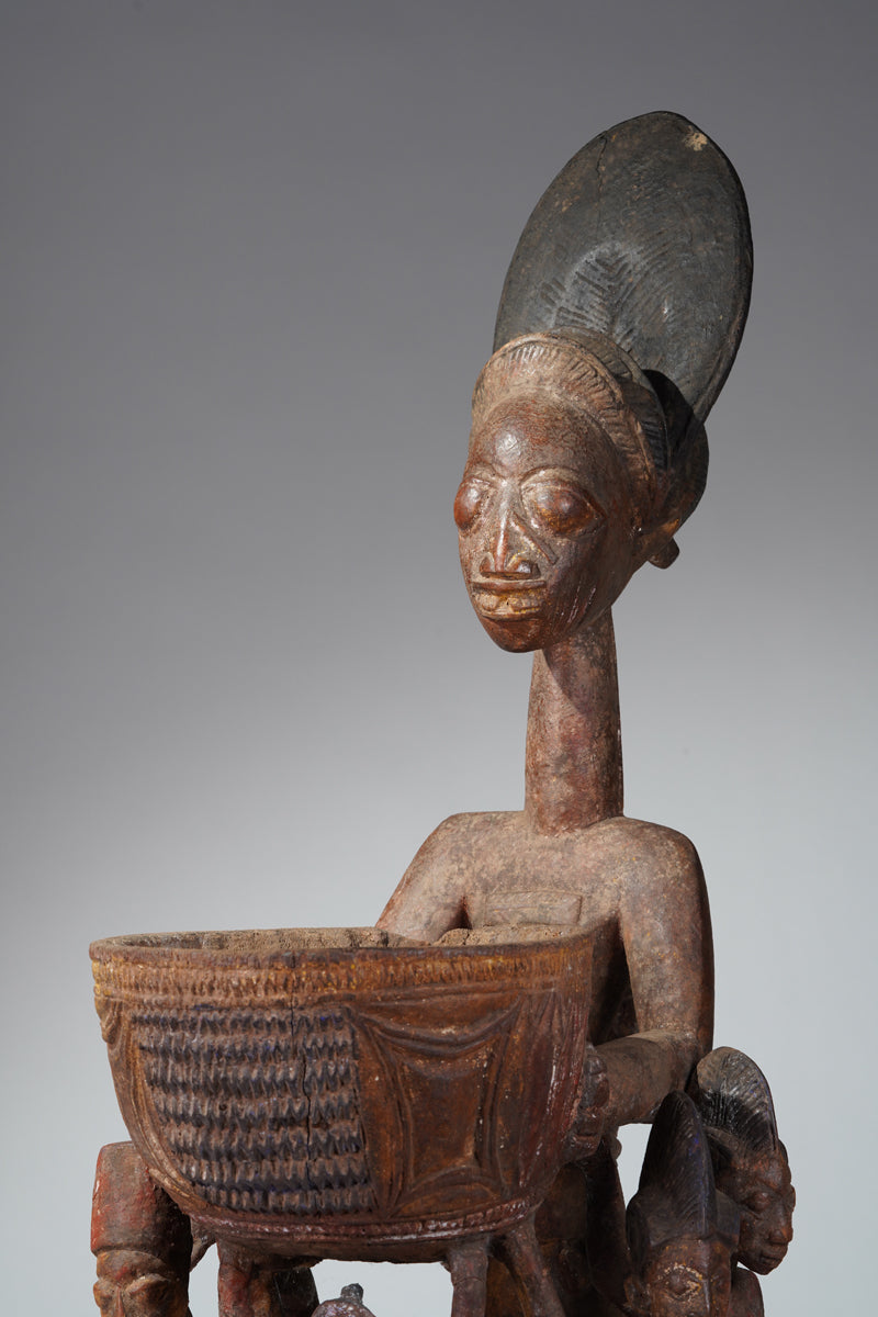 A Yoruba bowlkeeper
