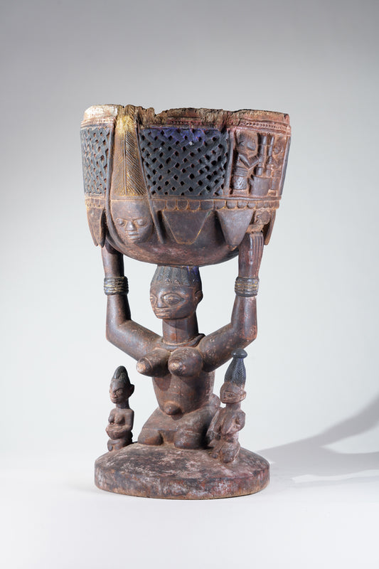 A Yoruba bowlkeeper