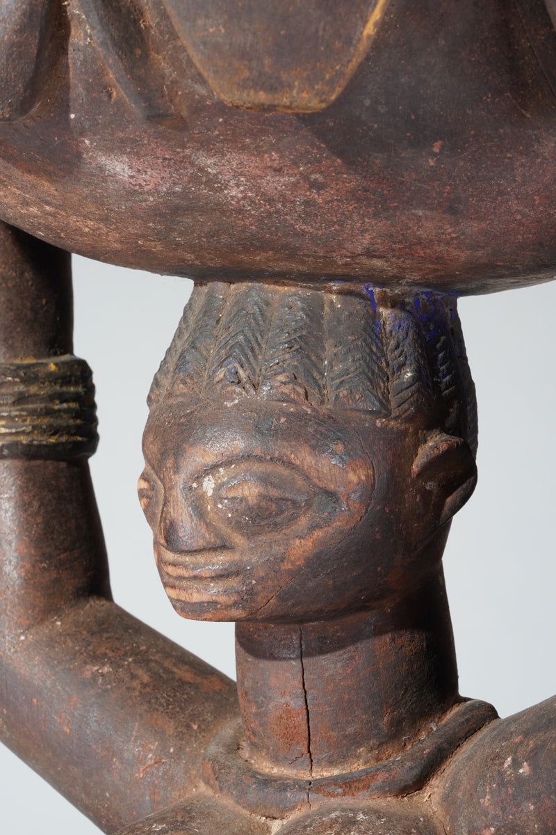 A Yoruba bowlkeeper