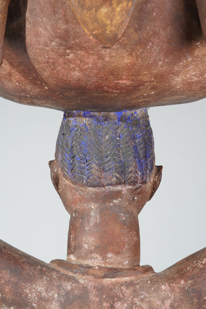 A Yoruba bowlkeeper