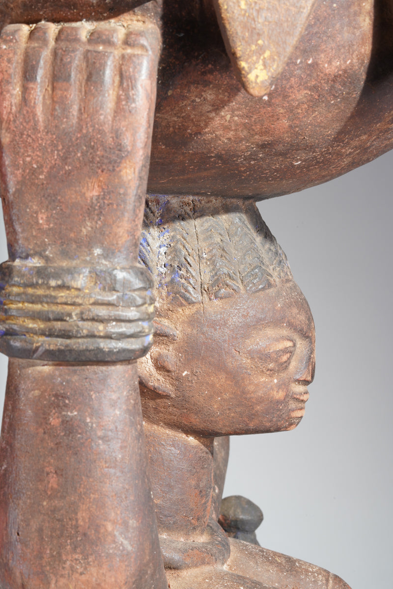 A Yoruba bowlkeeper