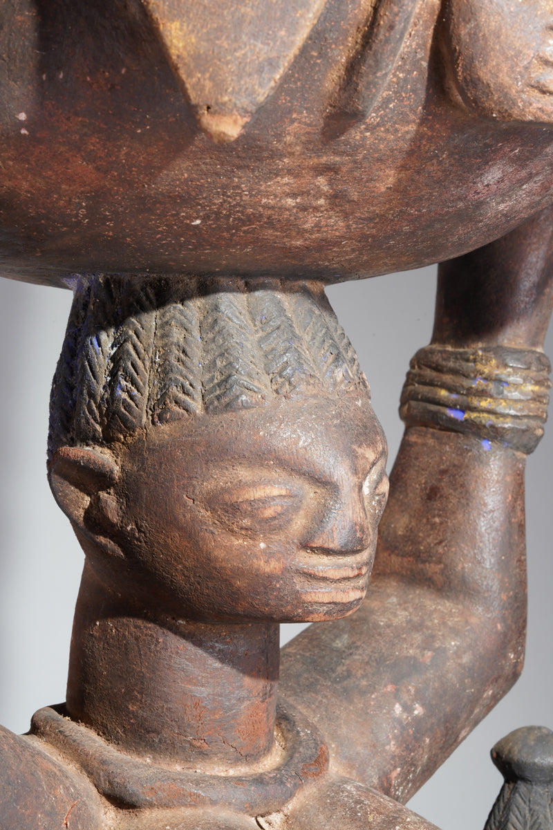 A Yoruba bowlkeeper