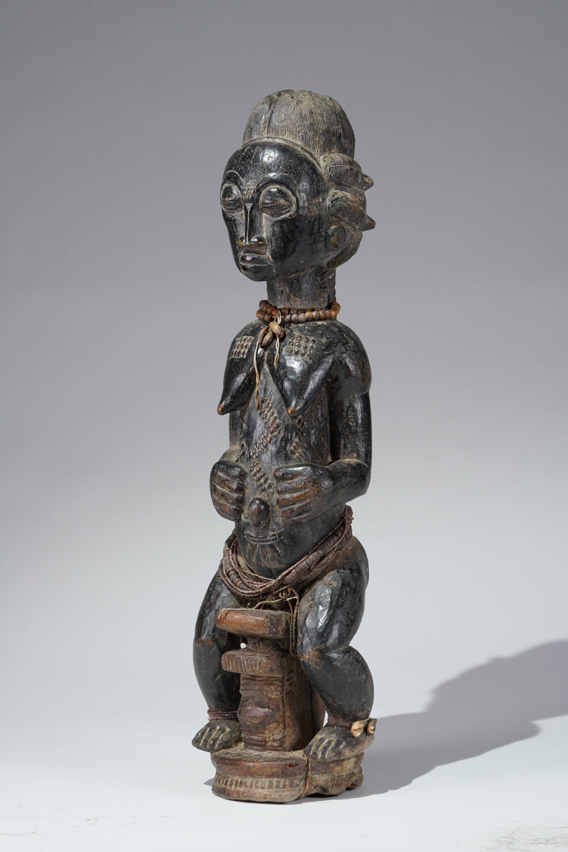 A female Baule figure