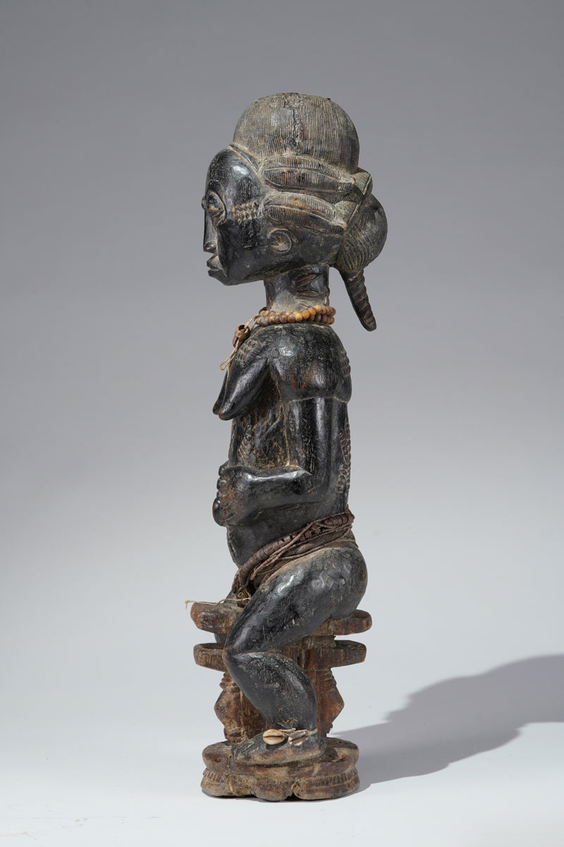 A female Baule figure