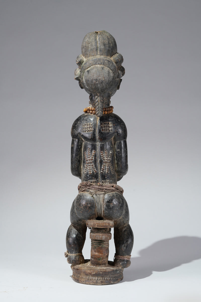 A female Baule figure