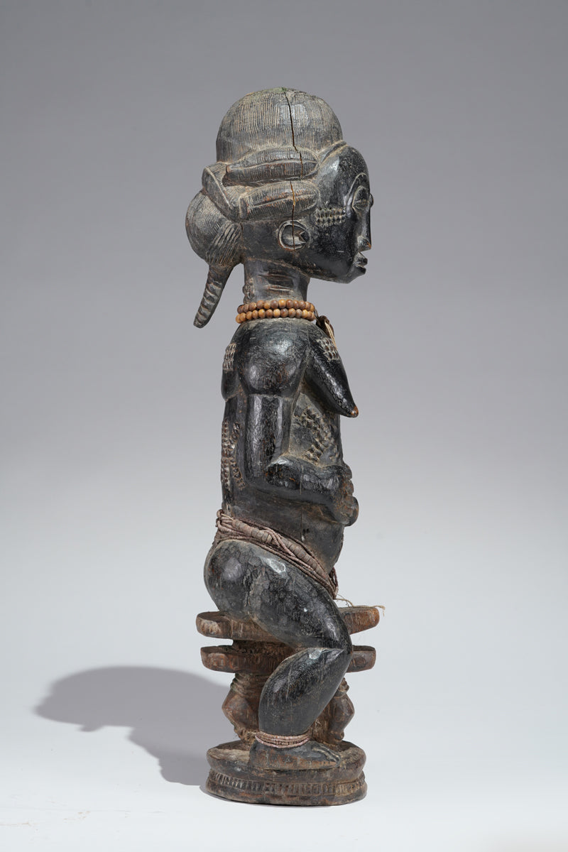 A female Baule figure