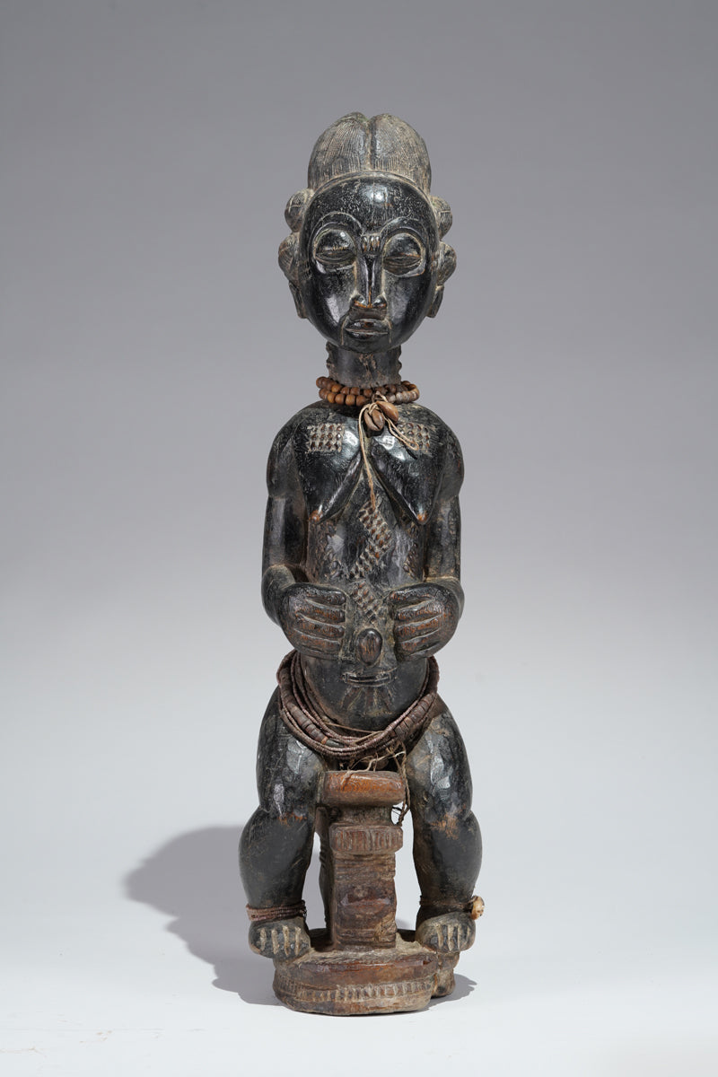 A female Baule figure