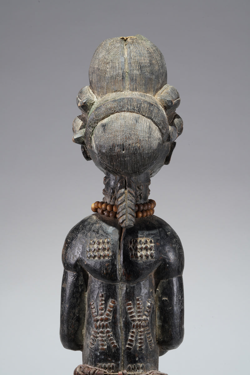 A female Baule figure