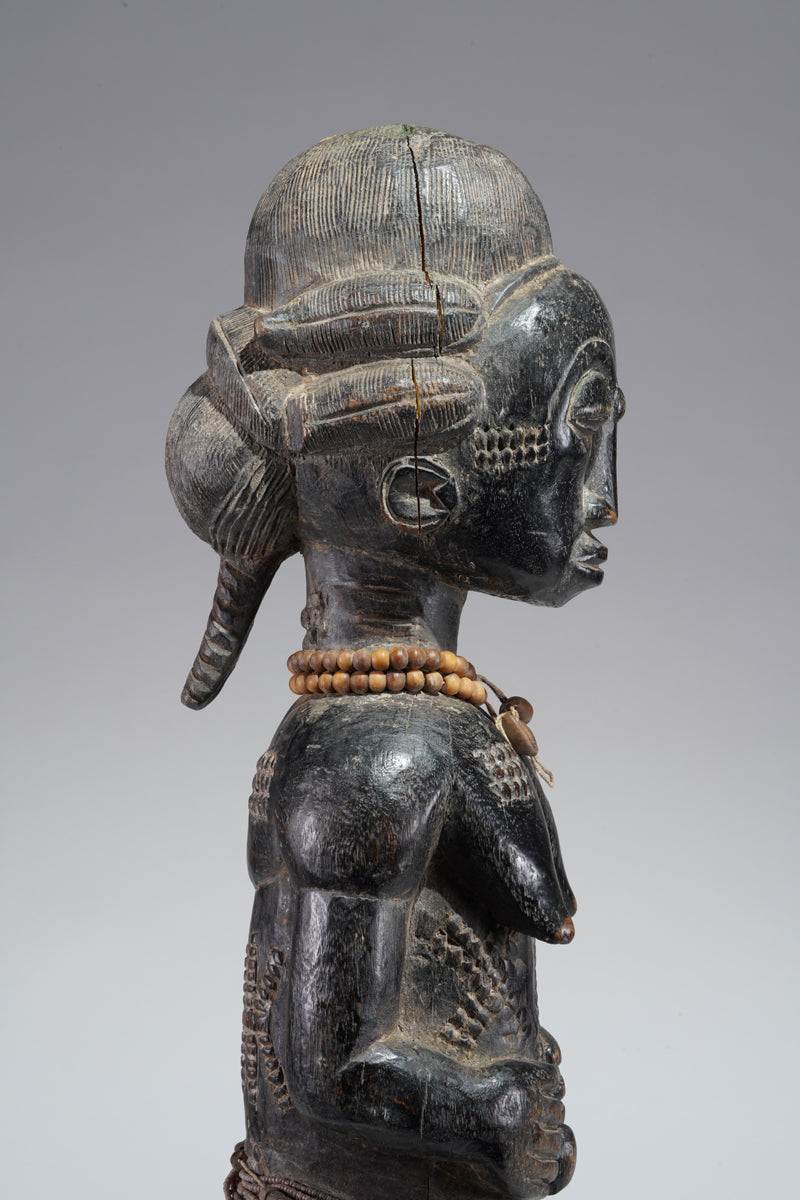A female Baule figure