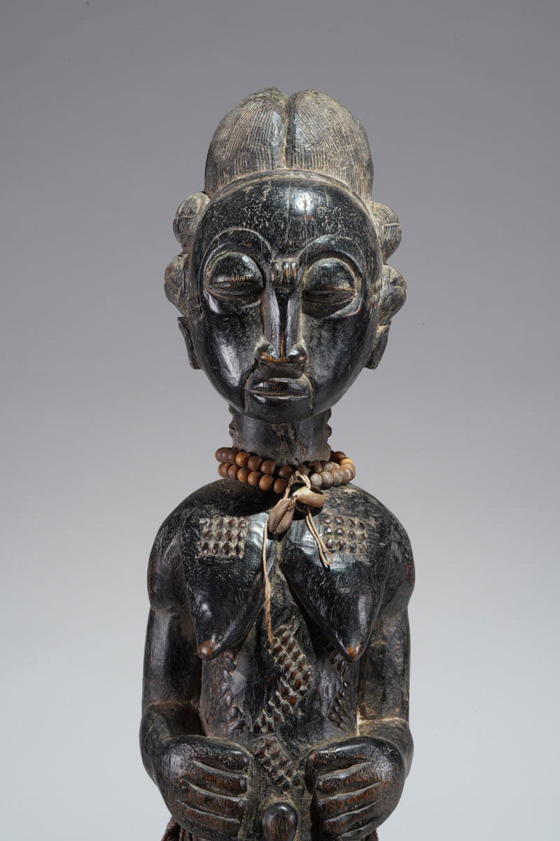 A female Baule figure