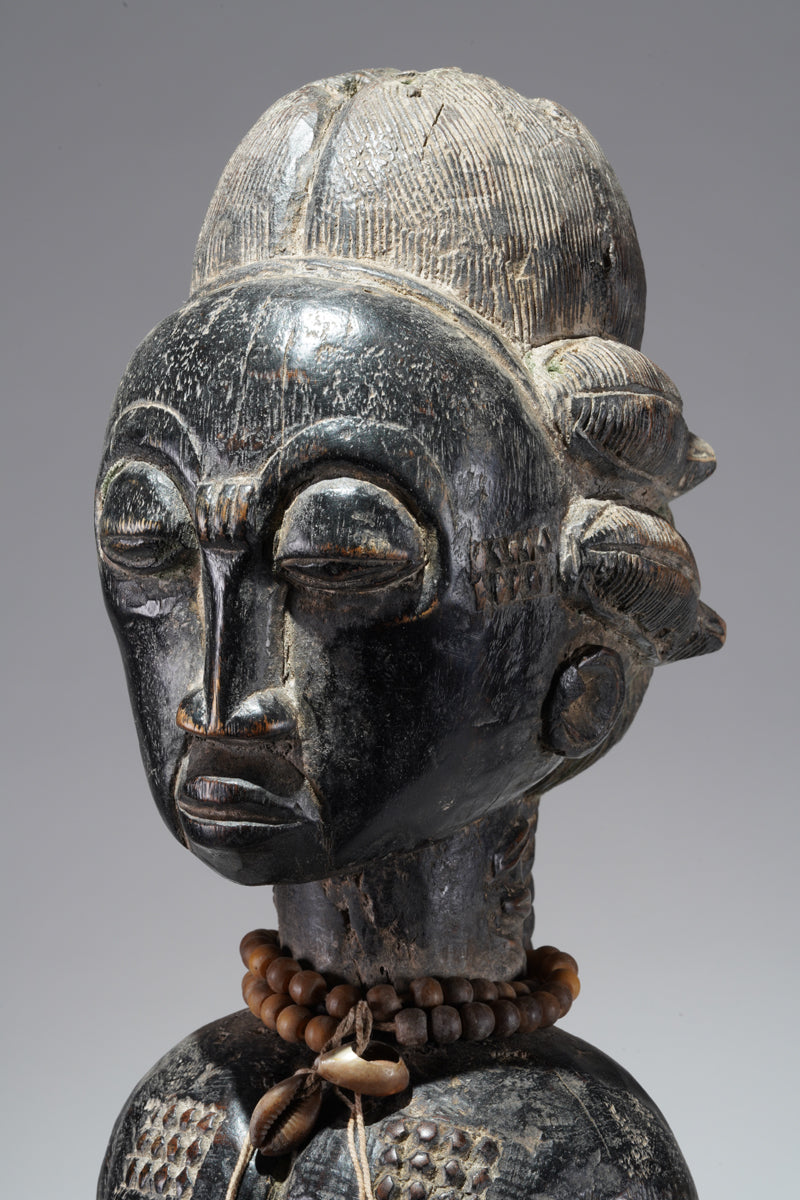 A female Baule figure