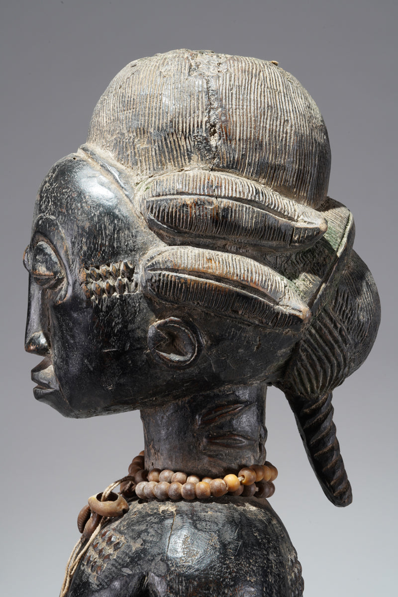 A female Baule figure