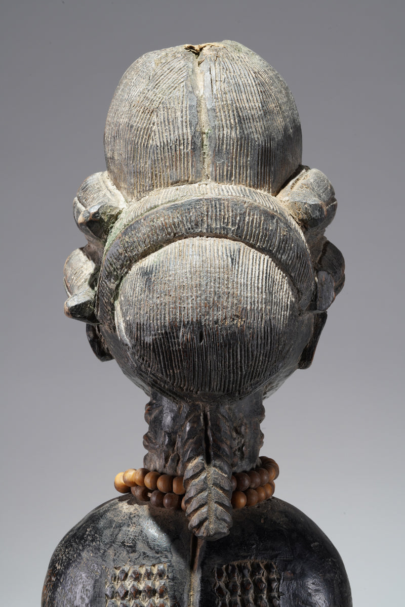 A female Baule figure