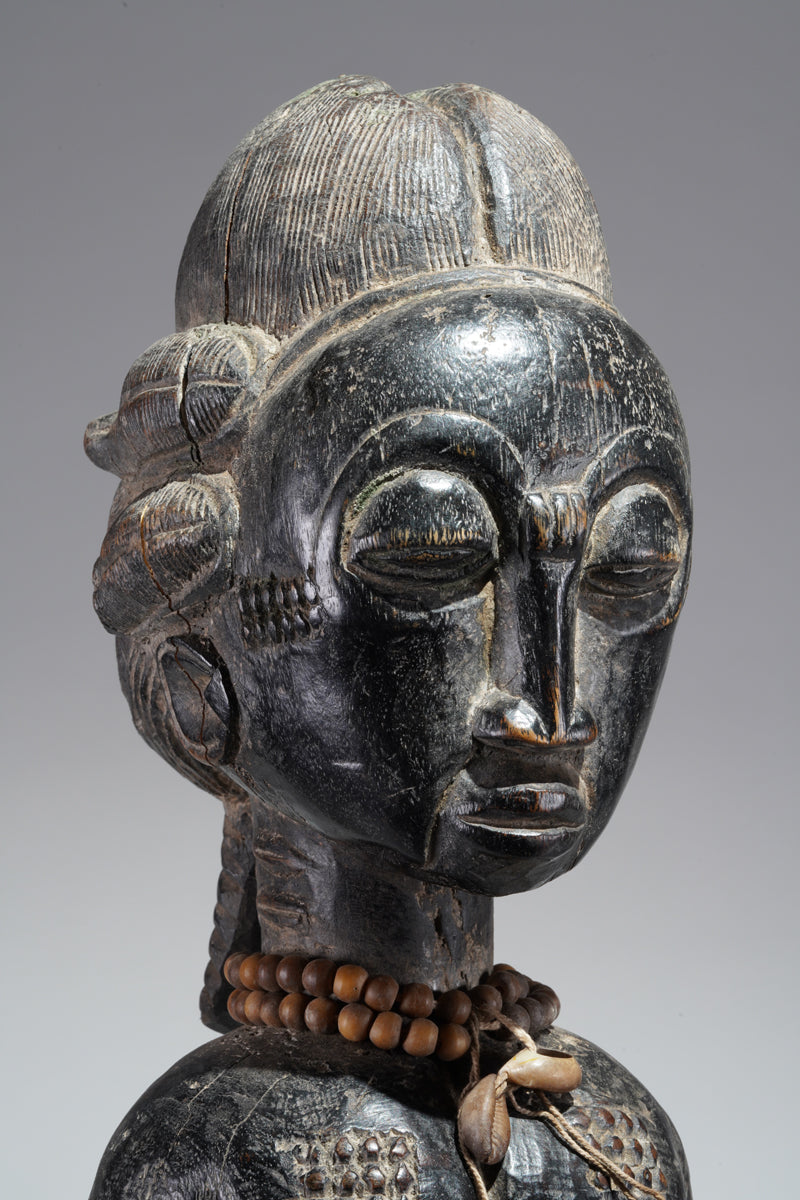 A female Baule figure
