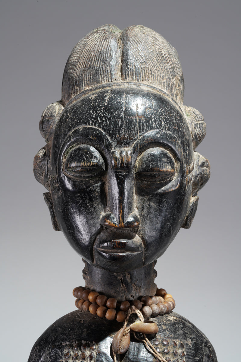 A female Baule figure