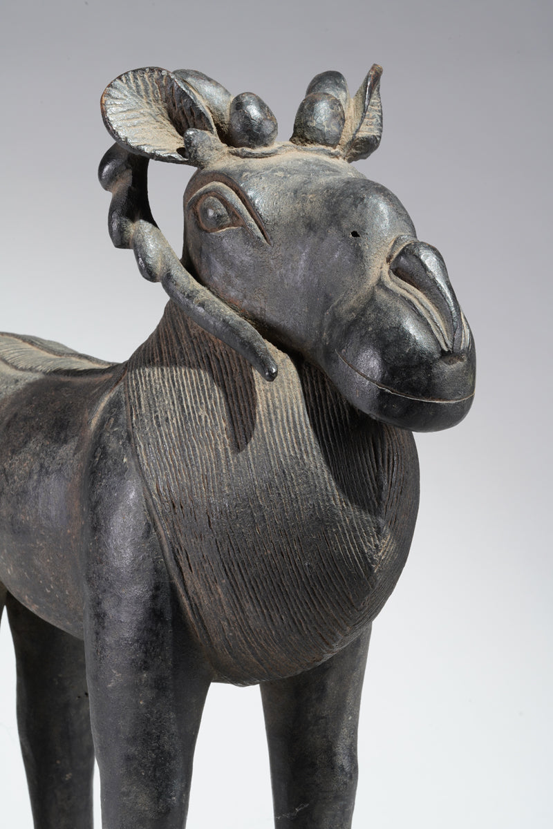 A Benin Bronze ram