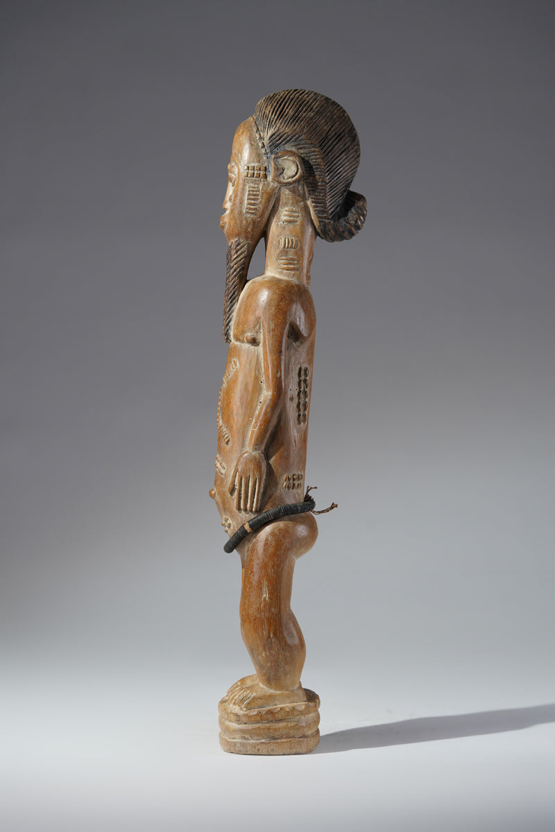 A Baule male sculpture