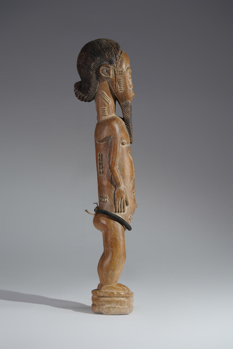 A Baule male sculpture