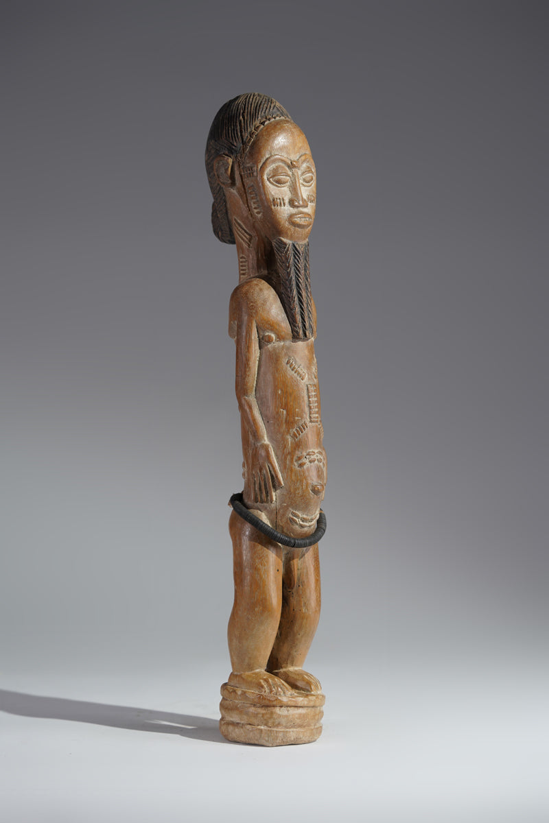 A Baule male sculpture