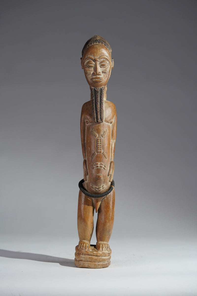 A Baule male sculpture