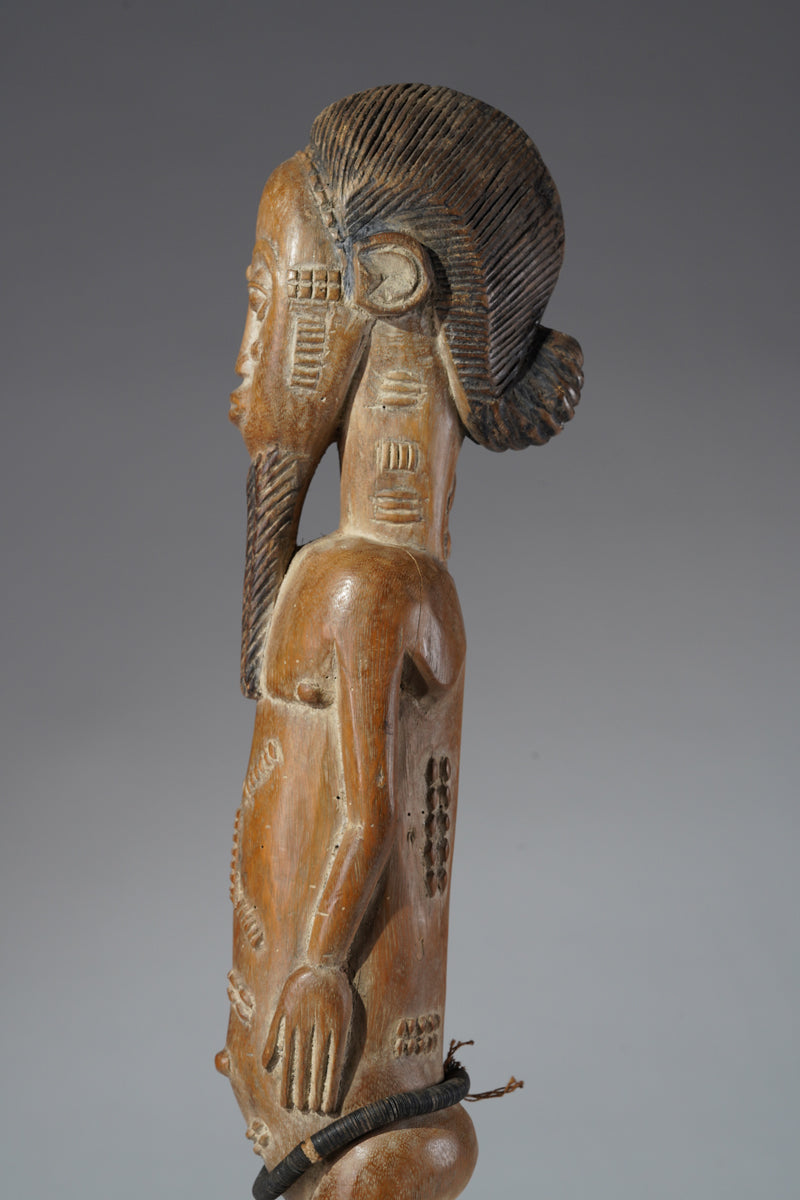 A Baule male sculpture