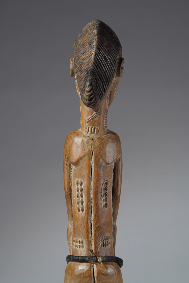 A Baule male sculpture