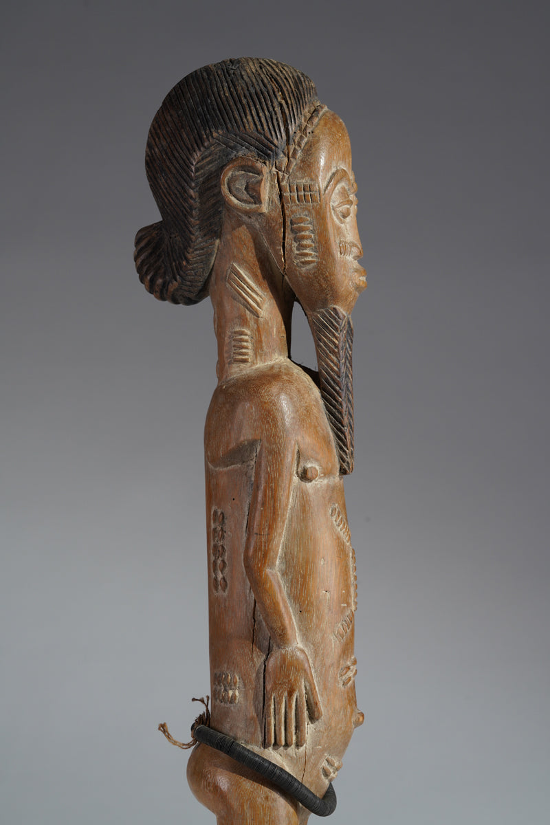 A Baule male sculpture