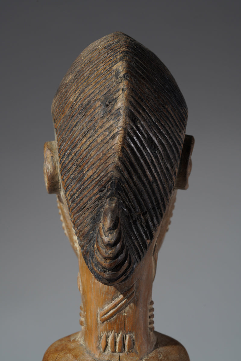 A Baule male sculpture